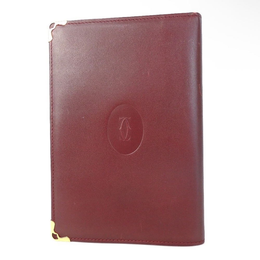 Cartier ($1099) Wallet /passport w/tons of cc compartment EUC